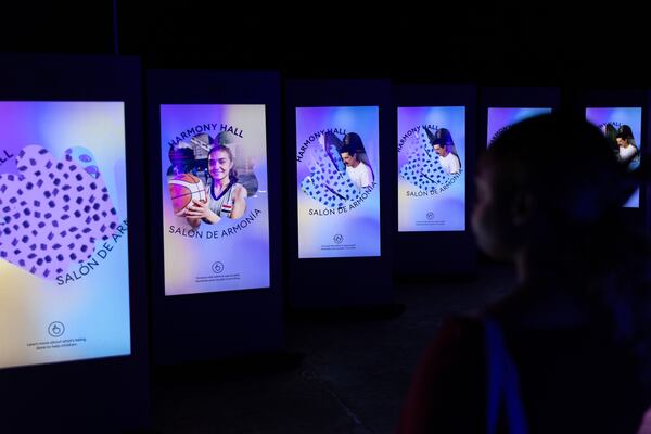 Atlanta Journal-Constitution reporter DeAsia Paige previews UNICEF USA’s experience for children and families, called "Heart Strings: Creating Connection to the World’s Children," at Pullman Yards in Atlanta on Thursday, April 18, 2024. (Arvin Temkar / arvin.temkar@ajc.com)