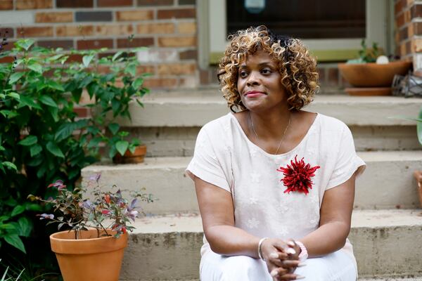 Valerie Taylor enjoys the outdoors at her house in Stone Mountain; she is a cancer survivor, and her Acute Myeloid Leukemia is in remission. So she was overjoyed after the Tuesday news that President Joe Biden had signed a new law that could help thousands of Georgia Medicare beneficiaries. (Miguel Martinez / miguel.martinezjimenez@ajc.com)
