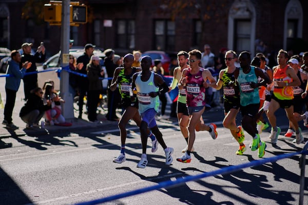 Runners in the men's elite division make their way through the Brooklyn borough during the New York City Marathon, Sunday, Nov. 3, 2024, in New York. (AP Photo/Eduardo Munoz Alvarez)