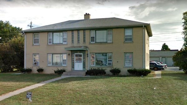 This apartment building in Cudahy, Wis., shown in a Google Street View image captured in October 2017, was the scene of a March 1, 2018, shooting that killed the 70-year-old landlord. Tenant Jason Christopher Tilley, 37, is accused of shooting the landlord after learning his rent was being increased by $30. Police said that Tilley, a convicted felon, killed the victim in the garage pictured behind the building and wrapped the man's body in a blanket before visiting his probation officer and going out for drinks.