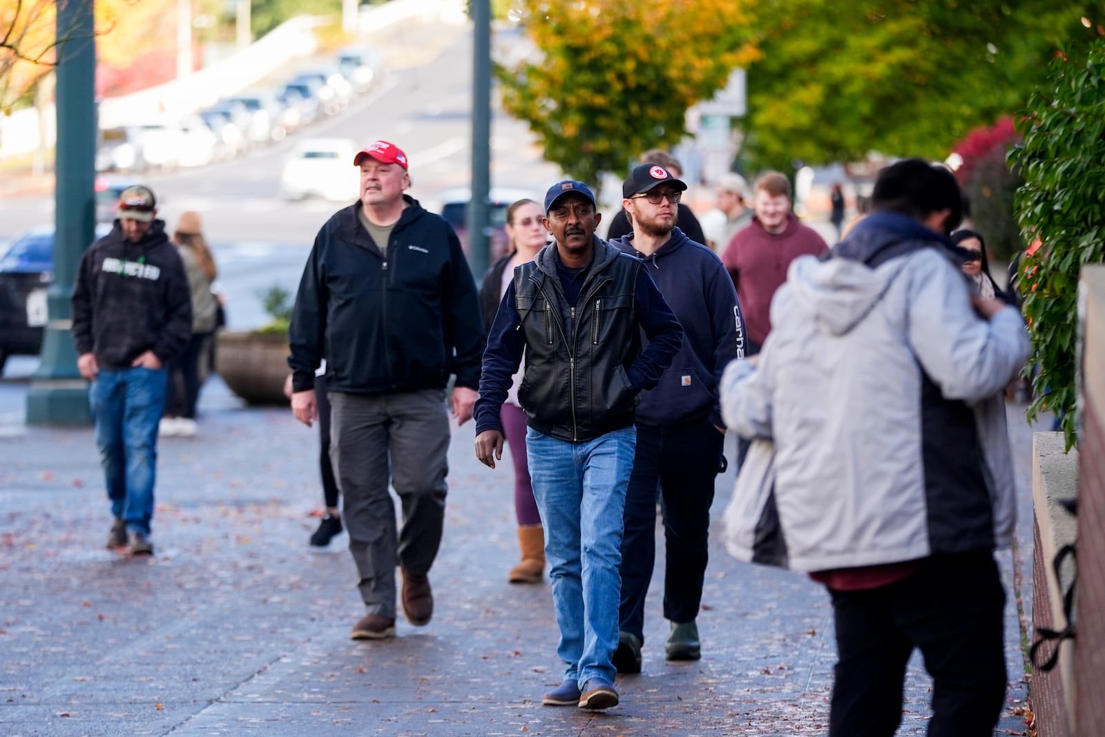 Boeing employees leave after voting on a new contract offer from the company, Monday, Nov. 4, 2024, outside the Angel of the Winds Arena in Everett, Wash. (AP Photo/Lindsey Wasson)