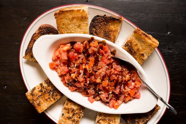 Tomato Bruschetta starter with grilled Italian bread. Photo credit- Mia Yakel