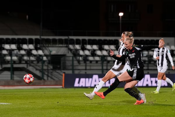 Arsenal's Stina Blackstenius scores his side's second goal during the women's Champions League soccer match between Juventus and Arsenal at the Vittorio Pozzo La Marmora Stadium in Biella, Italy, Tuesday, Nov. 12, 2024. (Fabio Ferrari/LaPresse via AP)