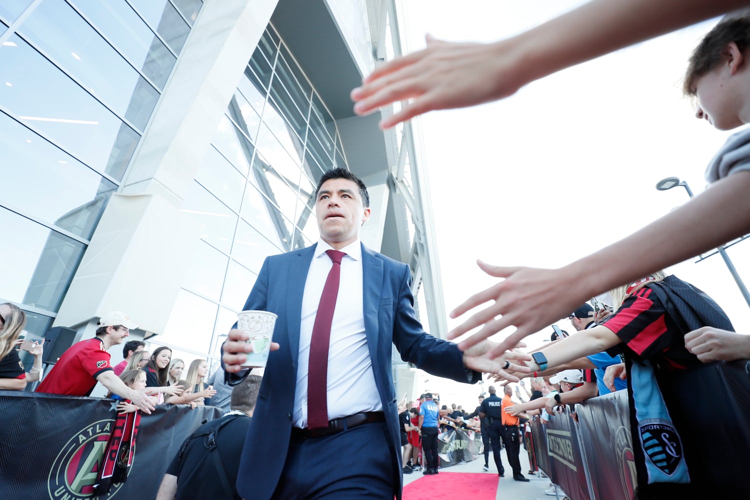 Atlanta United Coach Gonzalo Pineda greets supporters at the Mercedes-Benz Stadium before the game against the Columbus Crew on Saturday, May 28, 2022. The 5-Stripes haven’t lost at Mercedes-Benz Stadium in 13 matches.  Miguel Martinez / miguel.martinezjimenez@ajc.com