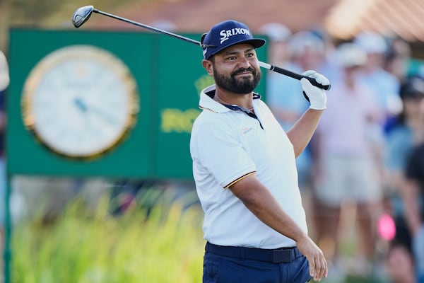 J.J. Spaun watches his tee shot on the 12th hole during the third round of The Players Championship golf tournament Saturday, March 15, 2025, in Ponte Vedra Beach, Fla. (AP Photo/Chris O'Meara)