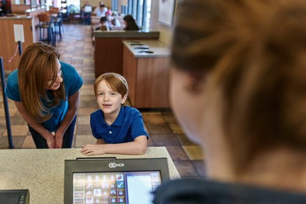 Keely Wright and her son, Isaac Chandler. Isaac has made tremendous strides at the Marcus Autism Center, including the ability to better communicate. CONTRIBUTED