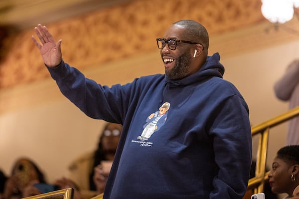 Atlanta rapper Killer Mike waves as he is recognized at the House of Representatives in the Capitol in Atlanta on Feb. 27, 2024. (Arvin Temkar/AJC 2024)