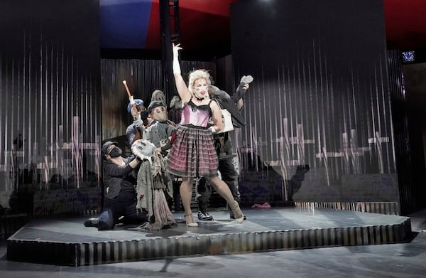 Polly Peachum (Kelly Kaduce) is surrounded by puppet beggars during The Atlanta Opera’s production of “The Threepenny Opera" presented under the Big Tent this spring. Courtesy of Ken Howard