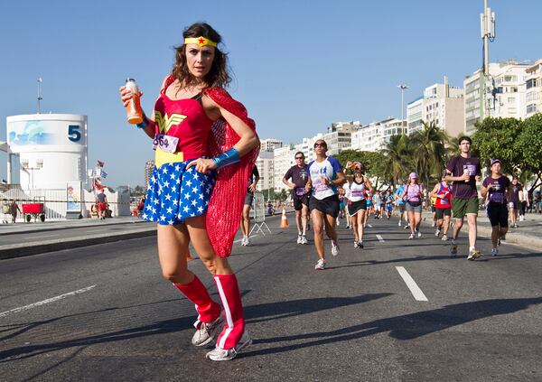 A woman poses in a Wonder Woman costume in Rio de Janeiro, Brazil