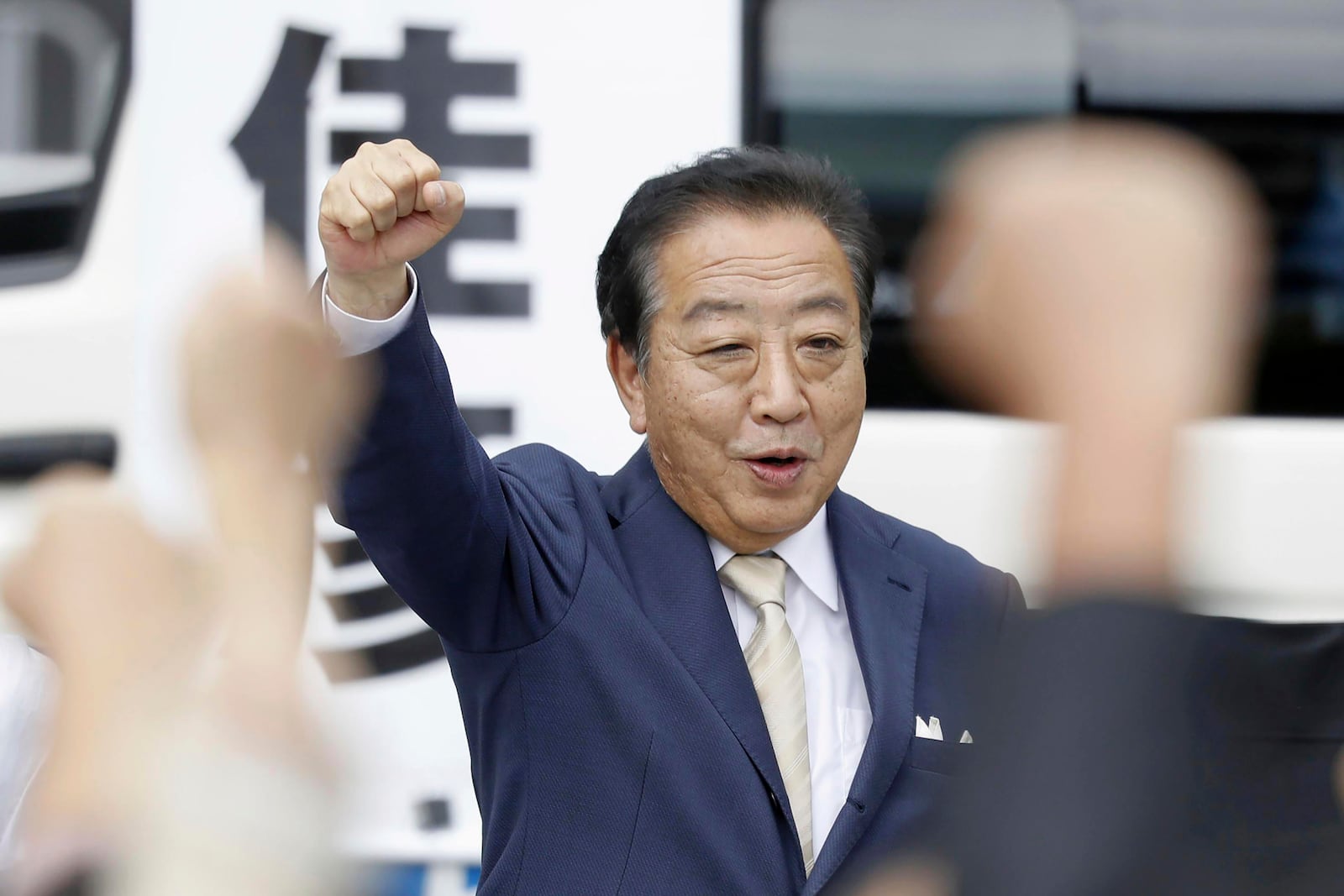 Head of Constitutional Democratic Party of Japan Yoshihiko Noda attends a campaigning for a parliamentary election in Fukuoka, southern Japan Wednesday, Oct. 23, 2024. (Kyodo News via AP)