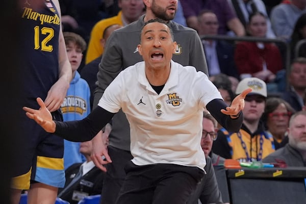 Marquette head coach Shaka Smart argues for a call during the first half of an NCAA college basketball game against the St. John's in the semifinals of the Big East tournament Friday, March 14, 2025, in New York. (AP Photo/Frank Franklin II)