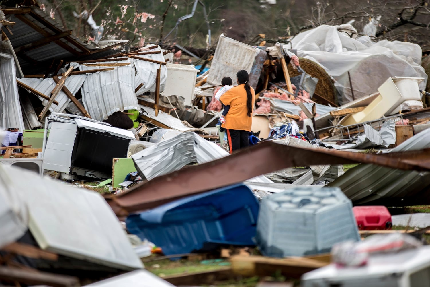 Strong storms in Georgia cause deaths, devastation