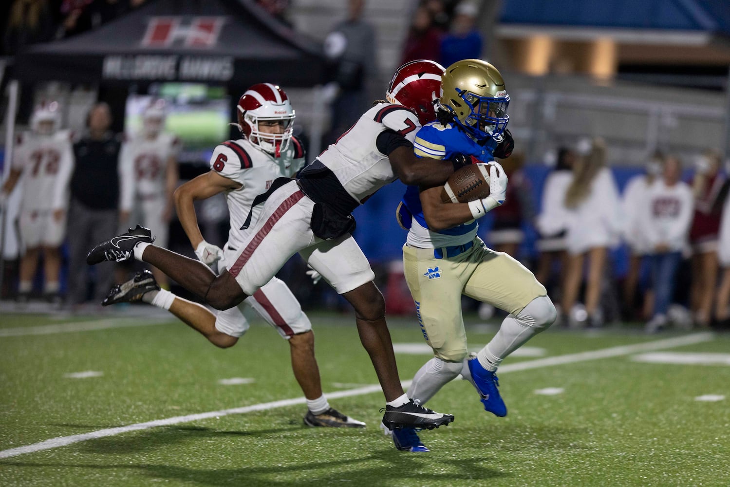 McEachern’s Nalin Scott (18) runs the ball during a NCAA High School football game between Hillgrove and McEachern at McEachern High School in Powder Springs, GA., on Friday, October 18, 2024. (Photo/Jenn Finch, AJC)