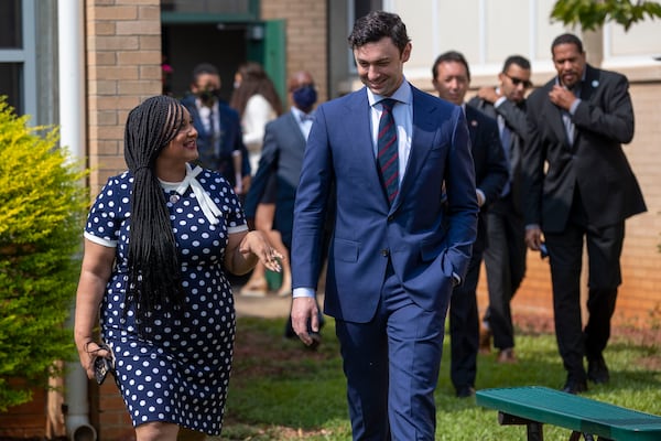 U.S. Congresswoman Nikema Williams, left, chats with U.S. Senator Jon Ossoff following tour and visit to Kelley Lake Elementary School in Decatur, Friday, July 23, 2021. (Alyssa Pointer/Atlanta Journal Constitution)