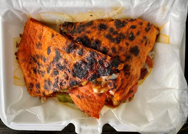 Chef Winnie’s Kitchen makes an Ethiopian-style chicken quesadilla. 
Wendell Brock for The Atlanta Journal-Constitution