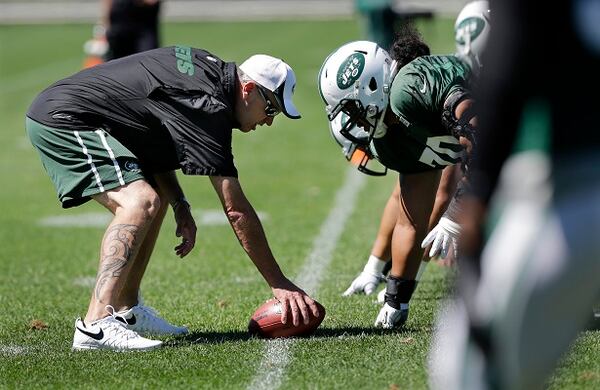 FILE- In this Sept. 4, 2013, file photo, New York Jets head coach Rex Ryan lines up over the ball against defensive players during football practice in Florham Park, N.J. The New York Jets owner Woody Johnson fired Ryan on Monday, Dec. 29, 2014, one day after one of the most disappointing seasons in franchise history. (AP Photo/Mel Evans, File) Would this man hike PSL sales? (Mel Evans/AP photo)