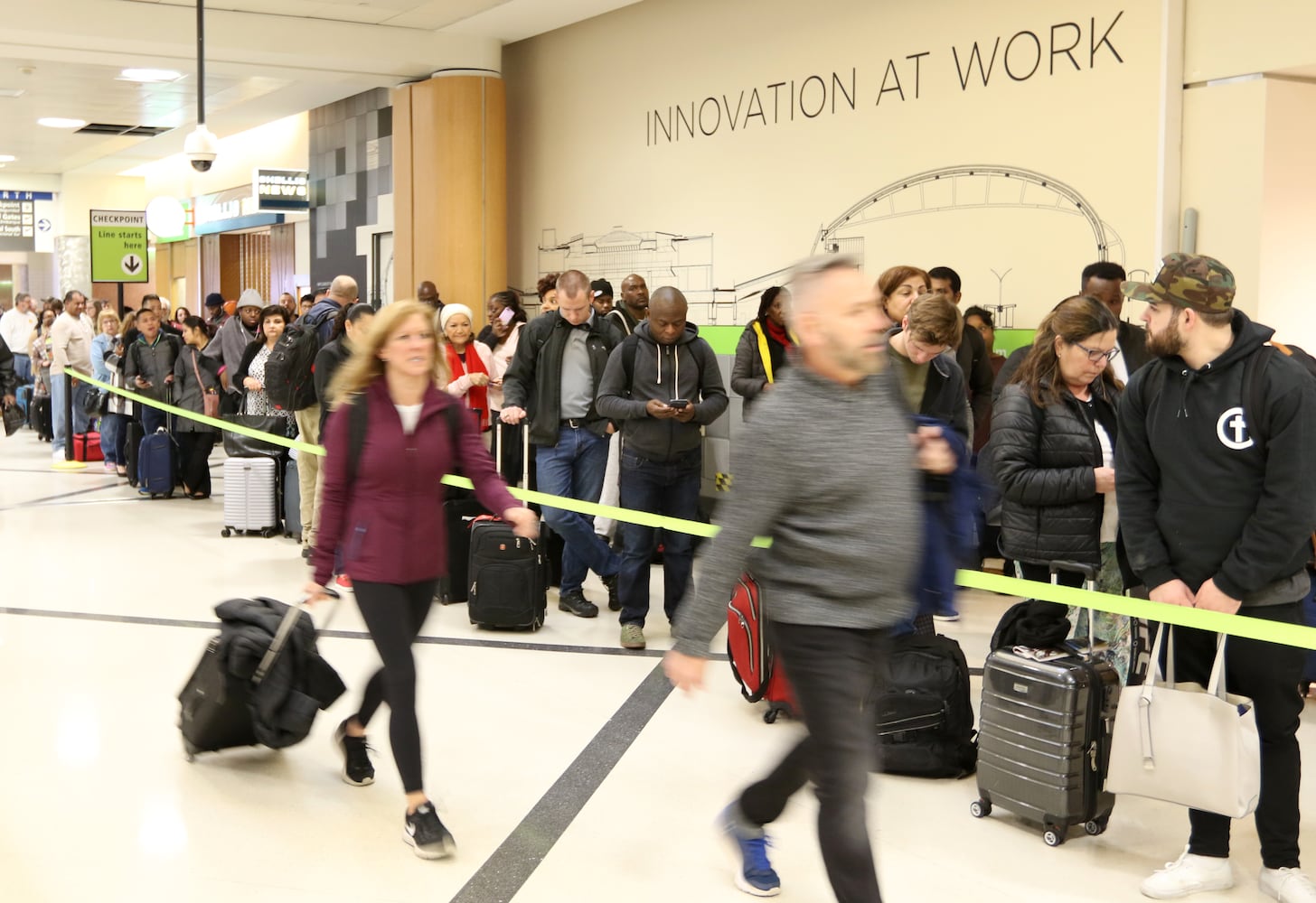 PHOTOS: Atlanta airport travelers stuck in long TSA wait lines