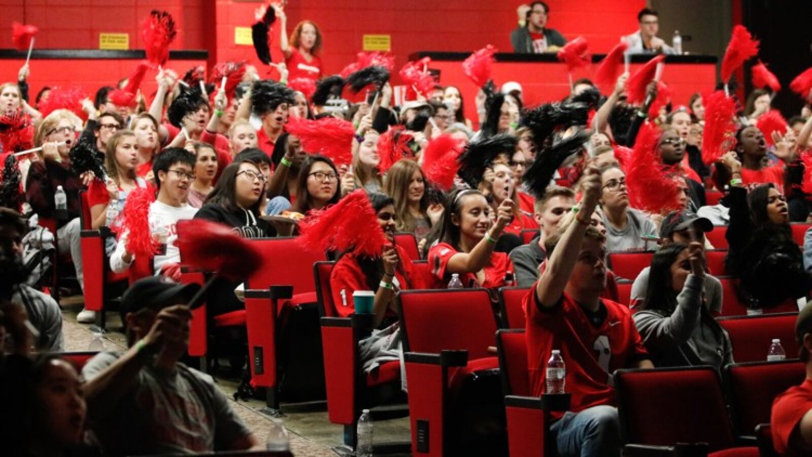 University of Georgia students cheer on the Bulldogs during the SEC Championship football game against Auburn on Saturday, December 2, 2017, at the Tate Student Center on the Athens campus. 