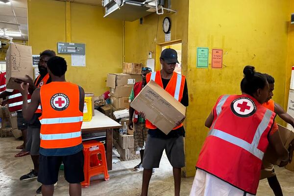 In this image released by Vanuatu Red Cross Society, its volunteers assist staff with the clean up at Vila Central Hospital in Port Vila, Vanuatu Wednesday, Dec. 18, 2024, following a powerful earthquake that struck just off the coast of Vanuatu in the South Pacific Ocean. (Vanuatu Red Cross Society via AP)