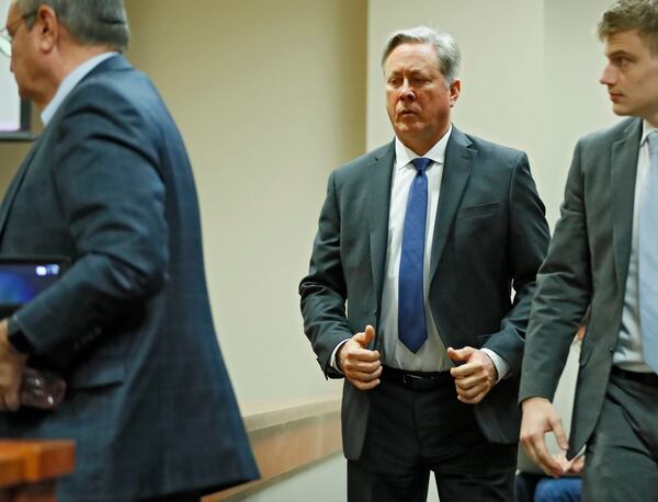 October 11, 2019 - Decatur - Robert Olsen heads to the defense table where the court will take up some mid-day questions from the jury.  Jury deliberations in the Robert "Chip" Olsen murder trial entered their fifth day.  Bob Andres / robert.andres@ajc.com