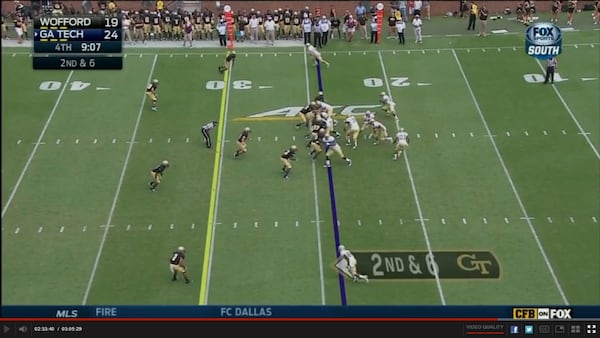 Right tackle Chris Griffin closes down the left end. Left guard Shaquille Mason wipes out the play-side linebacker, and center Freddie Burden does likewise with the nose tackle. Quarterback Justin Thomas pivots right to begin a double option with Snoddy.