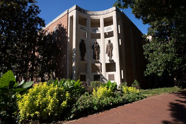 Statues of James Madison, Thomas Jefferson and James Monroe are seen at the city hall Oct. 10, 2024, in Charlottesville, Va. (AP Photo/Serkan Gurbuz)