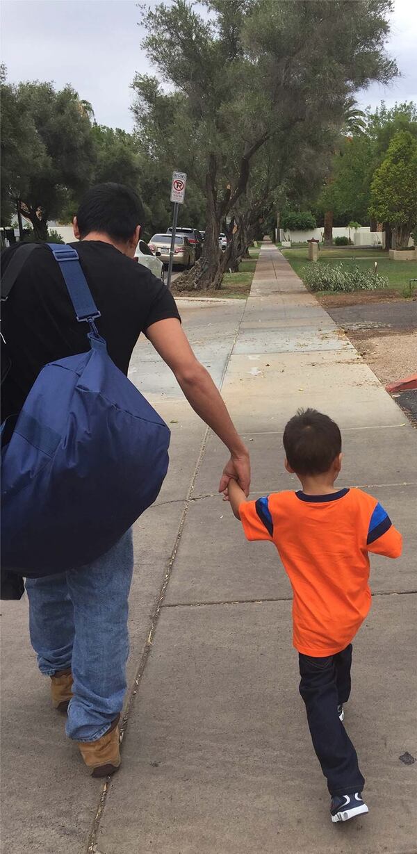 Jose, 27, and his son Jose, 3, after being reunited. Photo credit: Gracie Willis, SPLC