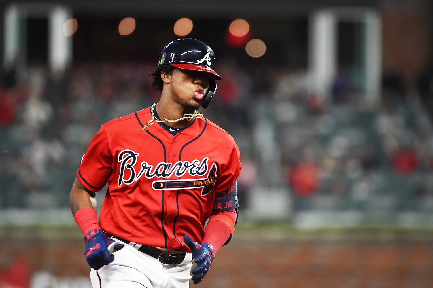 Photos: Braves break out red uniforms, host Marlins