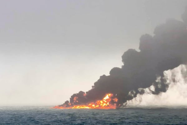 This image provided by Bartek Śmiałek shows smoke billowing from a vessel after a cargo ship hit a tanker carrying jet fuel off eastern England on Monday, March 10, 2025 setting both ablaze and sending fuel pouring into the North Sea. (Bartek Śmiałek via AP)