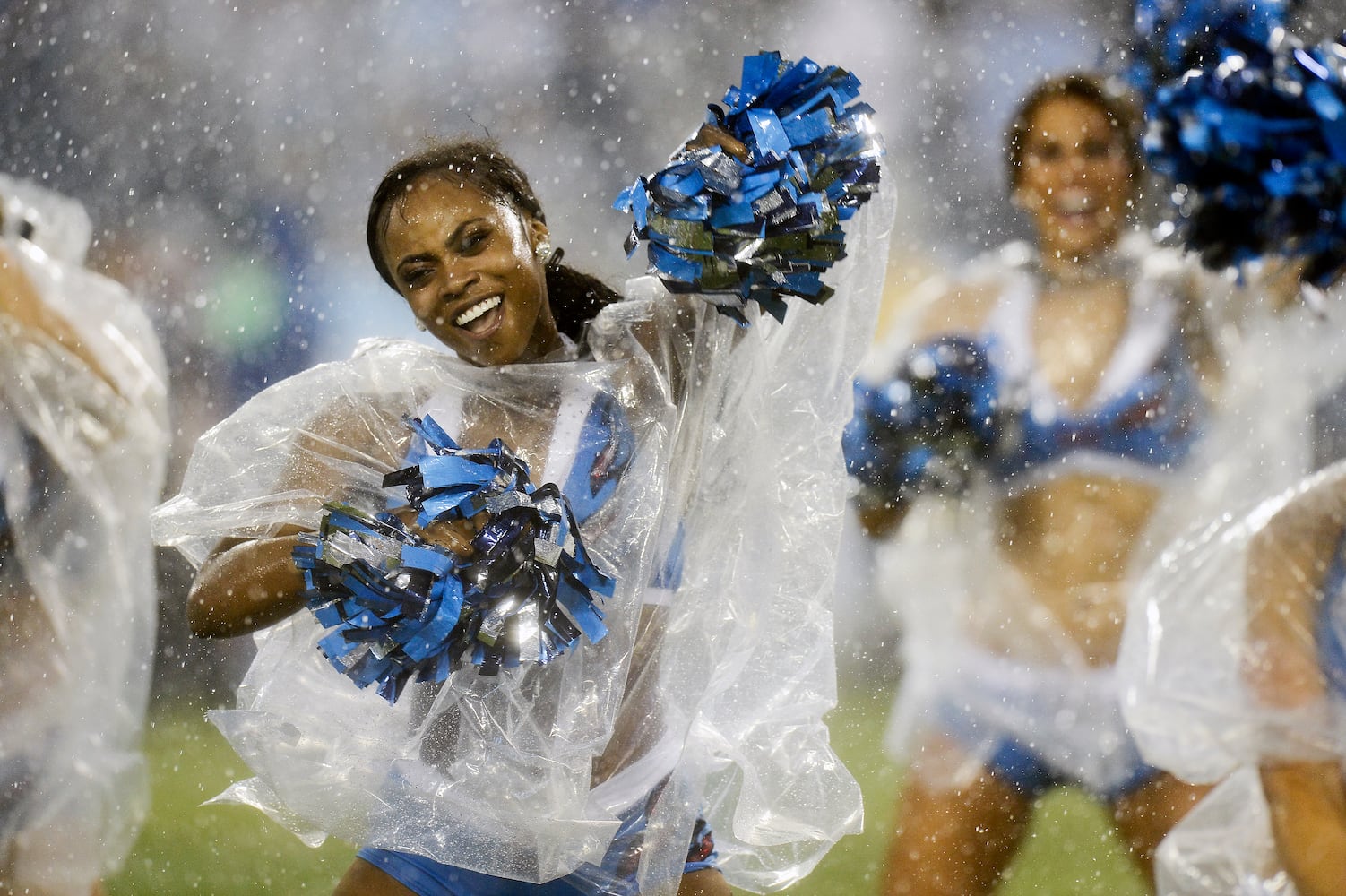 NFL cheerleaders perform at preseason games