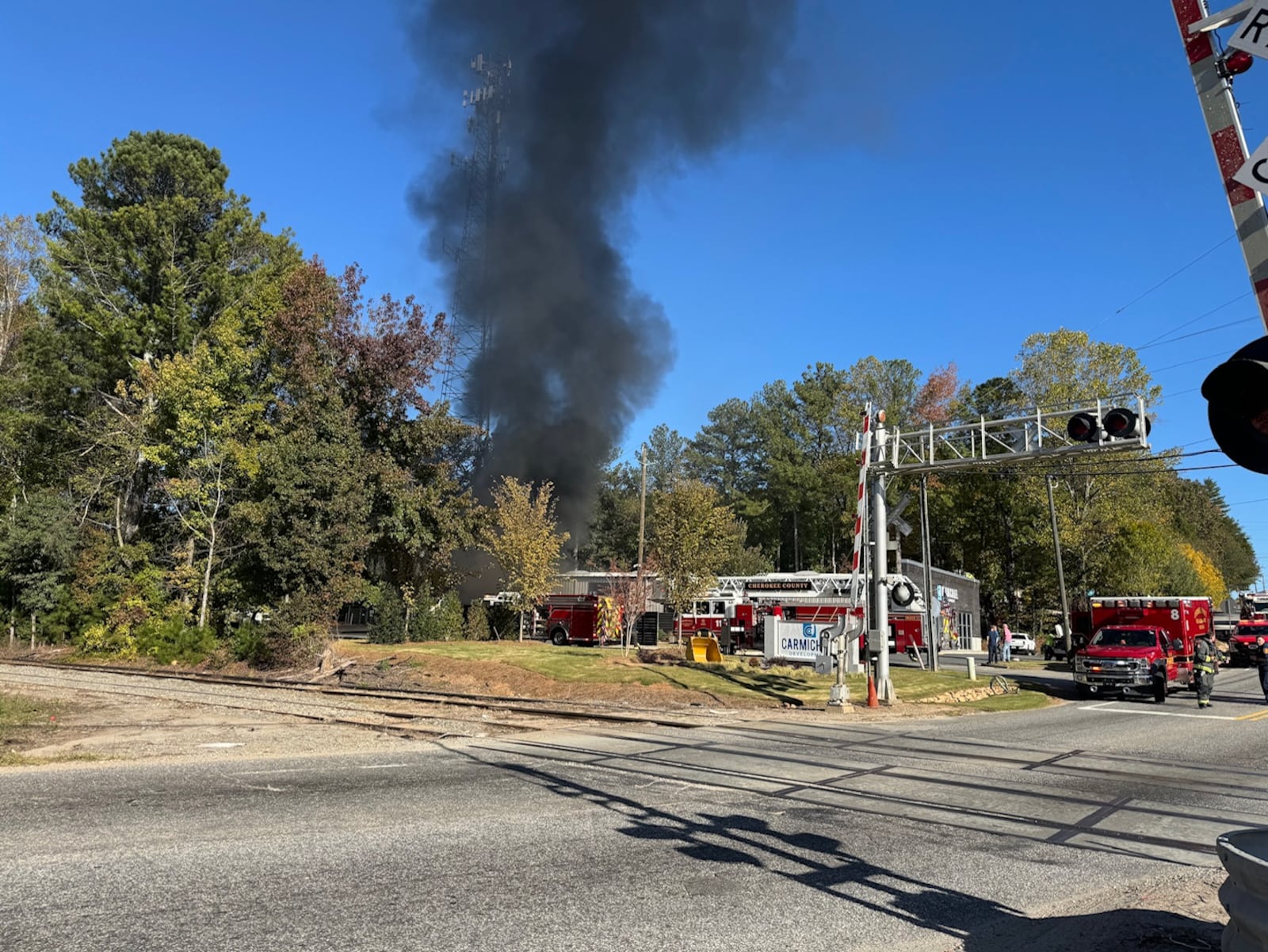 Crews responded to a fire Monday at Carmichael Development in Cherokee County, officials said.