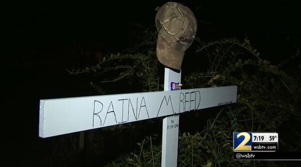 A memorial to Raina Reed near where she was killed in a car crash Thursday night. (Credit: Channel 2 Action News)