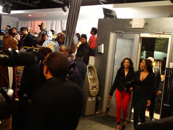 Lights! Camera! Action! Mimi Faust and Karlie Redd stroll into the lounge.