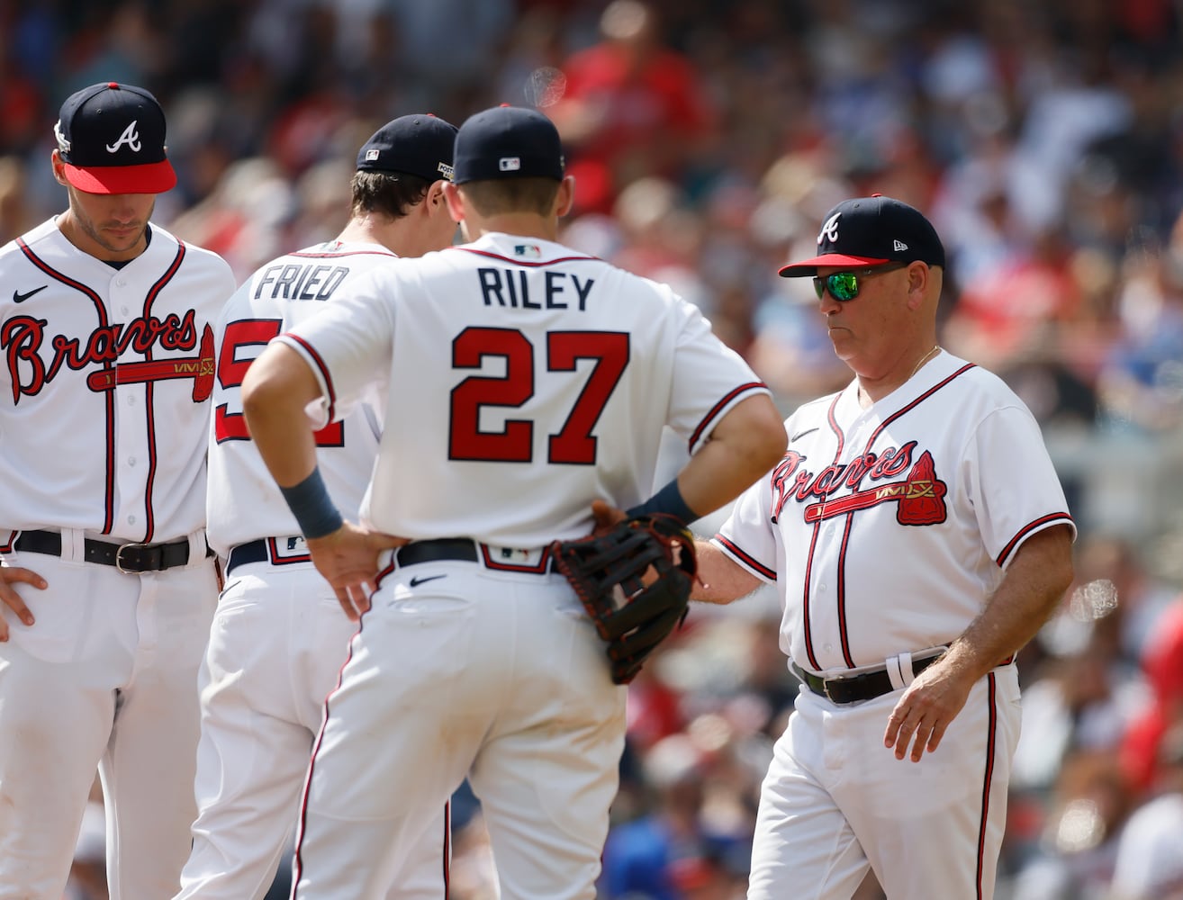 Atlanta Braves' Brian Snitker removes Max Fried during the fourth inning of game one of the baseball playoff series between the Braves and the Phillies at Truist Park in Atlanta on Tuesday, October 11, 2022. (Jason Getz / Jason.Getz@ajc.com)