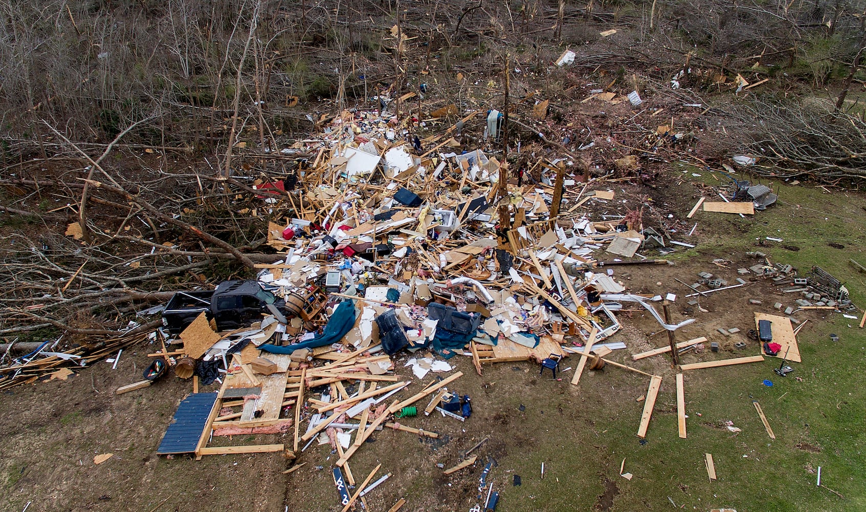 Photos: Tornadoes leave path of death, destruction in parts of Southeast