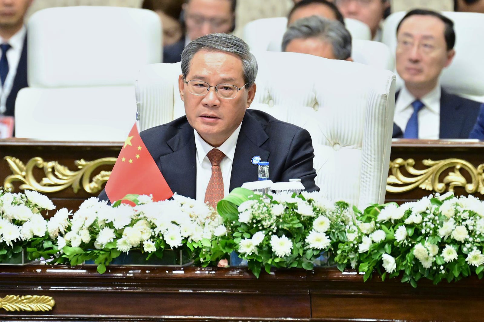 In this photo released by the Press Information Department, China's Premier Li Qiang delivers his speech at the Shanghai Cooperation Organization (SCO) meeting, in Islamabad, Pakistan, Wednesday, Oct. 16, 2024. (Press Information Department via AP)