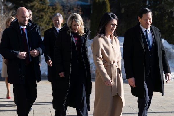 France's Foreign Minister Jean-Noel Barrot, from left, Canada's Foreign Minister Melanie Joly, Germany's Foreign Minister Annalena Baerbock and U.S. Secretary of State Marco Rubio arrive for the family photo during the G7 foreign ministers meeting in La Malbaie, Quebec, Canada, Thursday, March 13, 2025. (Saul Loeb/Pool via AP)