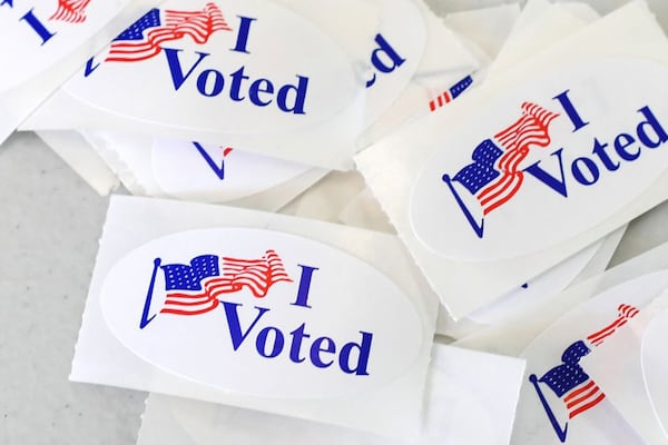 Plaintiffs including the Concerned Black Clergy of Metropolitan Atlanta, New Birth Missionary Baptist Church and the Faith in Action Network filed suit this past week alleging that Georgia's new election law makes it harder for Black, Latino and Asian American voters to cast ballots. (Robyn Beck/AFP/Getty Images/TNS)