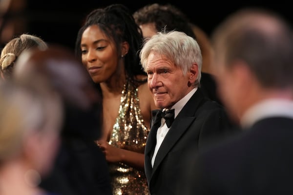 Jessica Williams, left, and Harrison Ford in the audience during the 31st annual Screen Actors Guild Awards on Sunday, Feb. 23, 2025, at the Shrine Auditorium in Los Angeles. (AP Photo/Chris Pizzello)