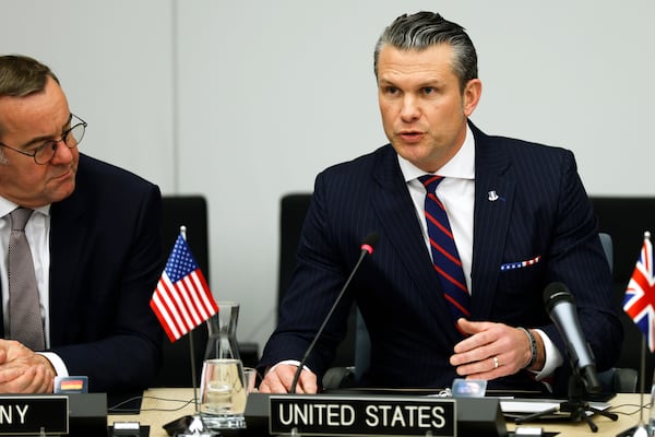 United States Secretary of Defense Pete Hegseth (right) speaks during a meeting of the Ukraine Defense Contact group at NATO headquarters in Brussels on Wednesday, Feb. 12, 2025. (Omar Havana/AP)