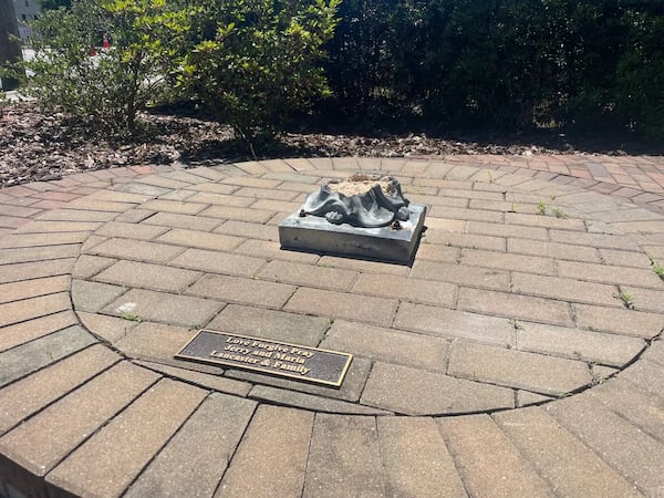 The prayer angel at Saint Michael's Catholic Church was destroyed in the aftermath of Orange Crush festivities on Saturday. (Photo Courtesy of Laura Nwogu/Savannah Morning News)