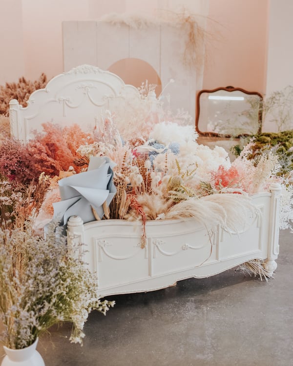 Outgrowing the original flower bar (shelf), the idea of bringing the shopping experience directly to the bed art installation was born. Here you can pick your own flowers or stems.