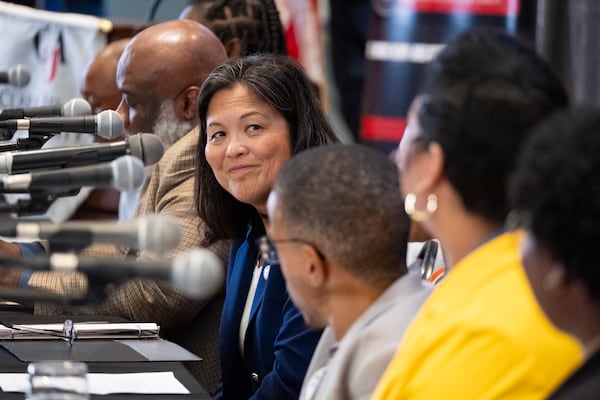 Julie Su, acting U.S. Secretary of Labor, listens to a speaker at an event at Clark Atlanta University on Wednesday, Sept. 25, 2024. (Ben Gray for the AJC)