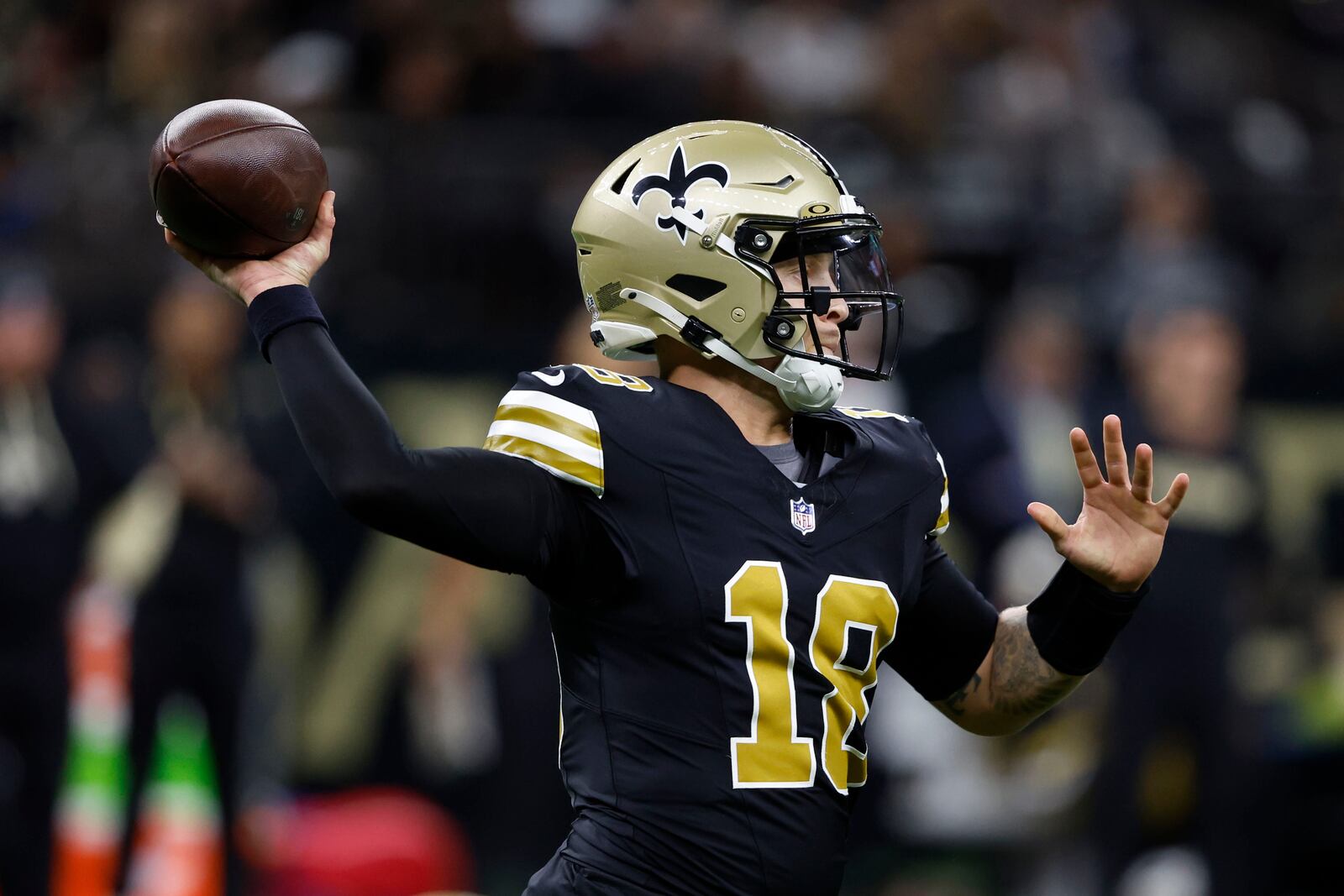 New Orleans Saints quarterback Spencer Rattler throws a pass during the first half of an NFL football game against the Denver Broncos, Thursday, Oct. 17, 2024, in New Orleans. (AP Photo/Butch Dill)