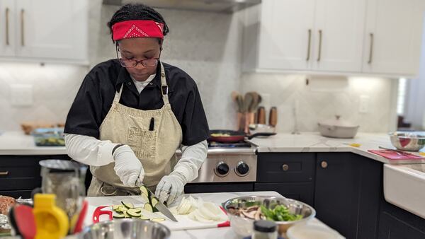 Whitney Gray, a personal chef for Cookonnect, prepares two meals for clients on Sunday, April 14, 2024. Mirtha Donastorg/mirtha.donastorg@ajc.com