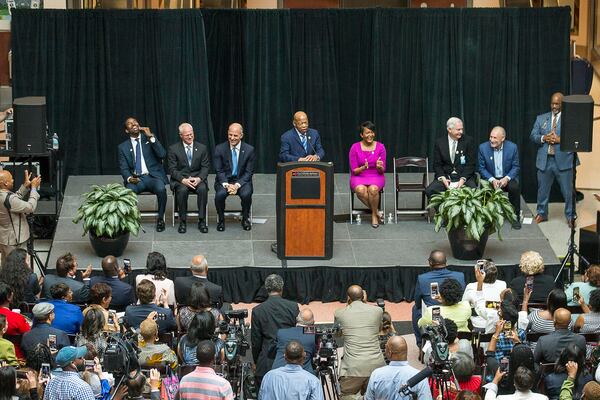 04/08/2019 -- Atlanta, Georgia -- Congressman John Lewis (center) speaks during his art exhibit tribute in the atrium of the domestic terminal at Atlanta's Hartsfield Jackson International Airport, Monday, April 8, 2019. The art exhibit "John Lewis-Good Trouble" was unveiled Monday with historical artifacts, audio and visual installations and tributes to the congressman.  