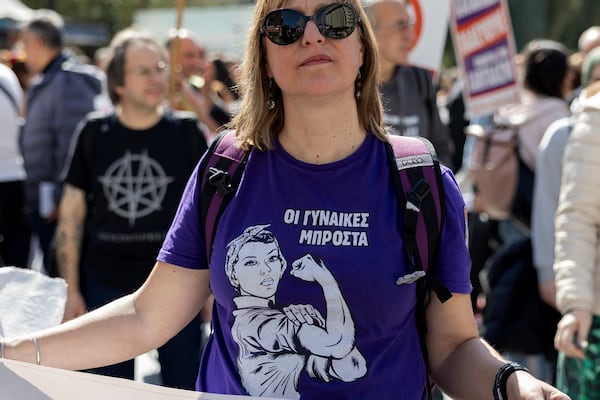 A protester takes part in a rally marking International Women's Day, in Athens, Saturday, March 8, 2025. (AP Photo/Yorgos Karahalis)