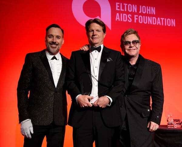 NEW YORK, NY - OCTOBER 28: (L-R) David Furnish, Charlie Hendon and Elton John attend the Elton John AIDS Foundation's 13th Annual An Enduring Vision Benefit at Cipriani Wall Street on October 28, 2014 in New York City. (Photo by Jamie McCarthy/WireImage) *** Local Caption *** David Furnish; Charlie Hendon; Elton John