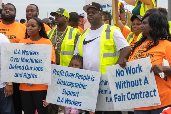 Dockworkers on strike at the Georgia Ports Authority on Oct. 1 in Garden City. Katelyn Myrick/AJC