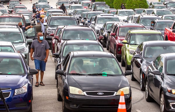 People wait in line to receive their Covid vaccinations shots at the Mall at Stonecrest Saturday, August 28, 2021. STEVE SCHAEFER FOR THE ATLANTA JOURNAL-CONSTITUTION